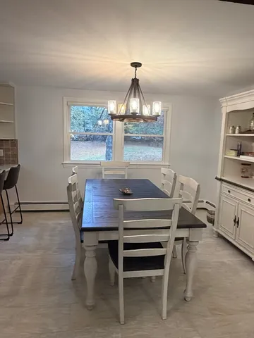 a view of a workspace with furniture