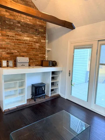 a living room with a wooden floor