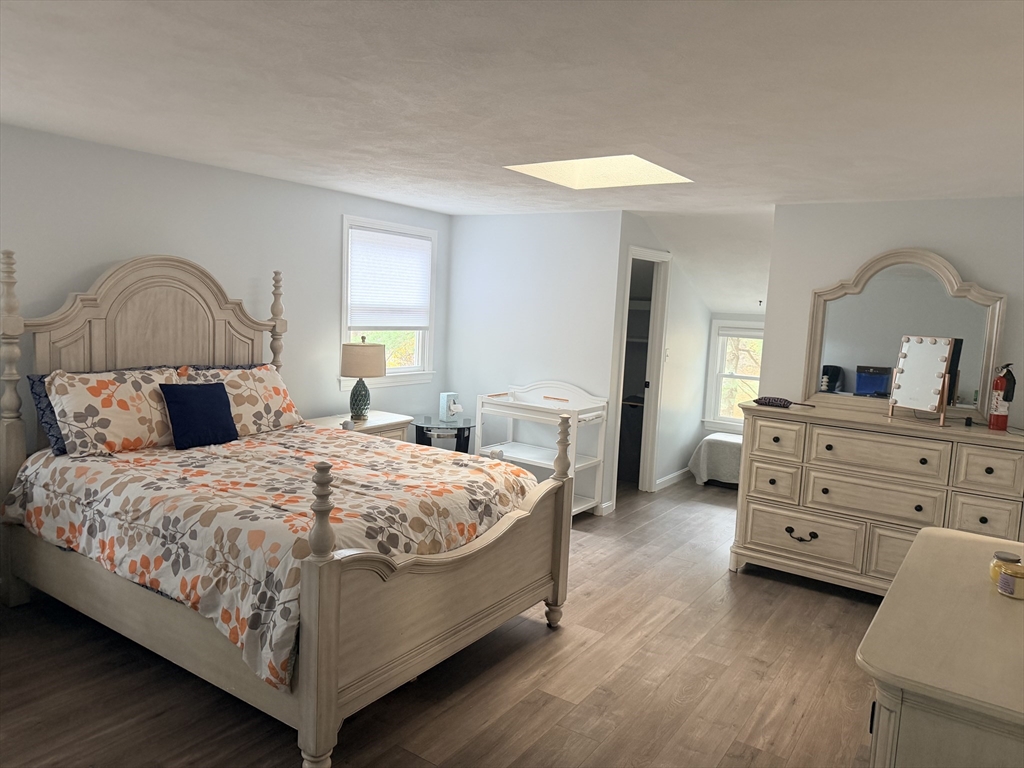 18 Boxford Road Topsfield, MA 01983 - Photo 26 of 37 a bedroom with a bed and a dresser