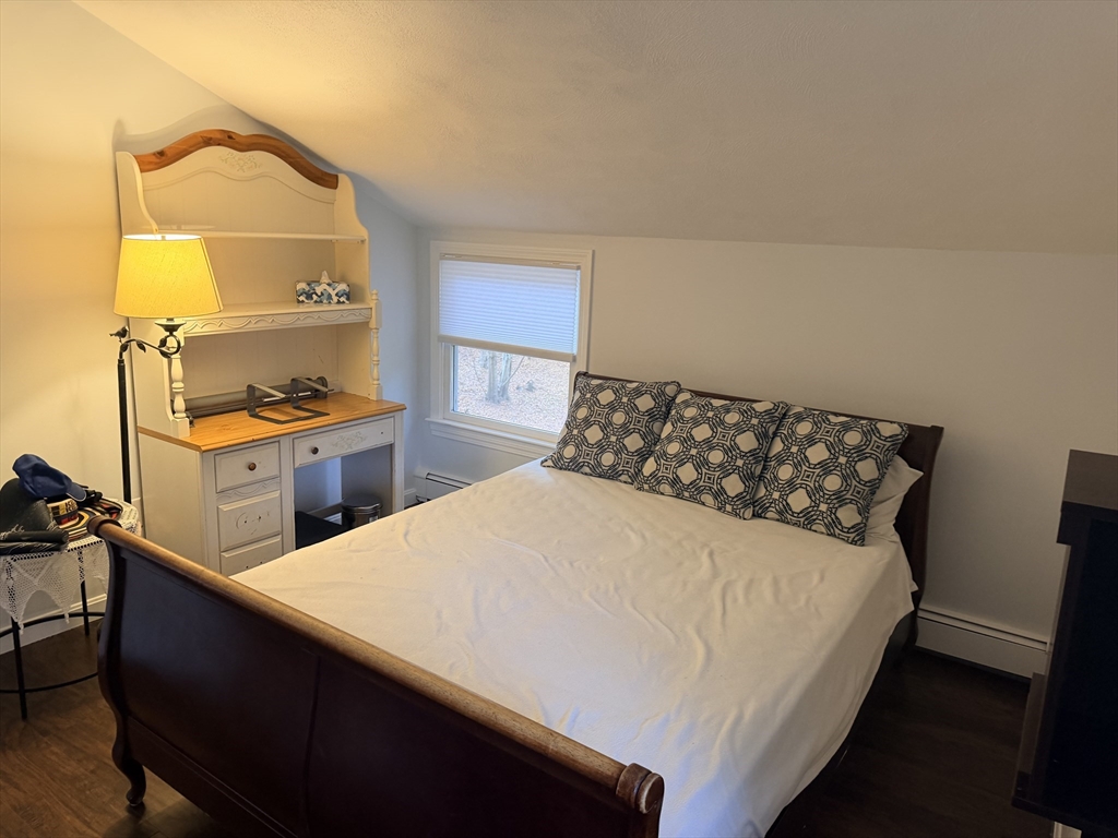 18 Boxford Road Topsfield, MA 01983 - Photo 32 of 37 a bed sitting in a bedroom next to a window