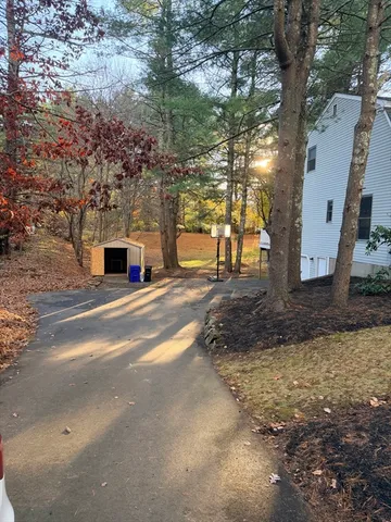 a view of swimming pool with a yard