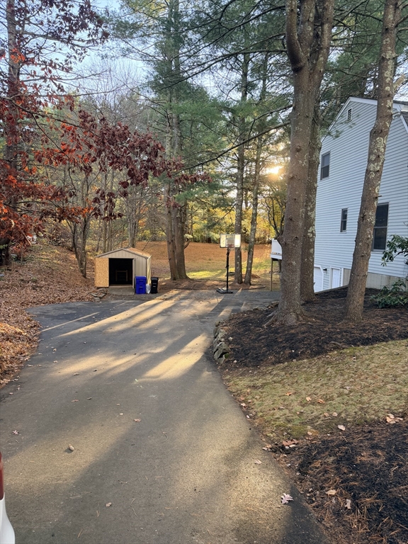 18 Boxford Road Topsfield, MA 01983 - Photo 5 of 37 a view of swimming pool with a yard