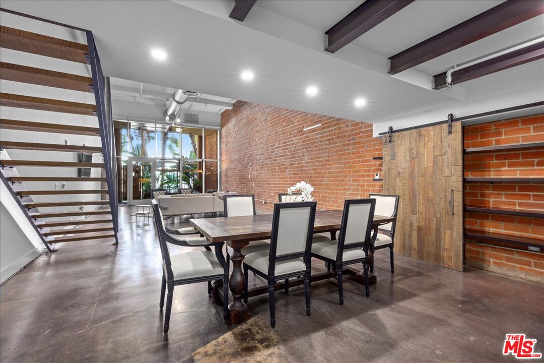 120 South Hewitt Street, Unit 6 Los Angeles, CA 90012 - Photo 11 of 48 a view of a dining room with furniture