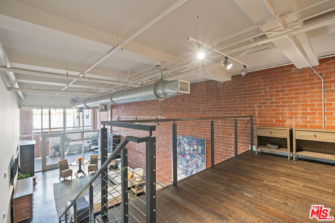 120 South Hewitt Street, Unit 6 Los Angeles, CA 90012 - Photo 21 of 48 a view of a room with furniture