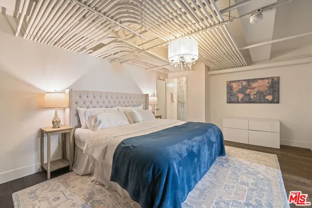 a bathroom with a toilet and shower