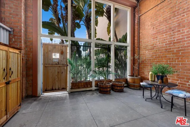 a view of an entryway with a door