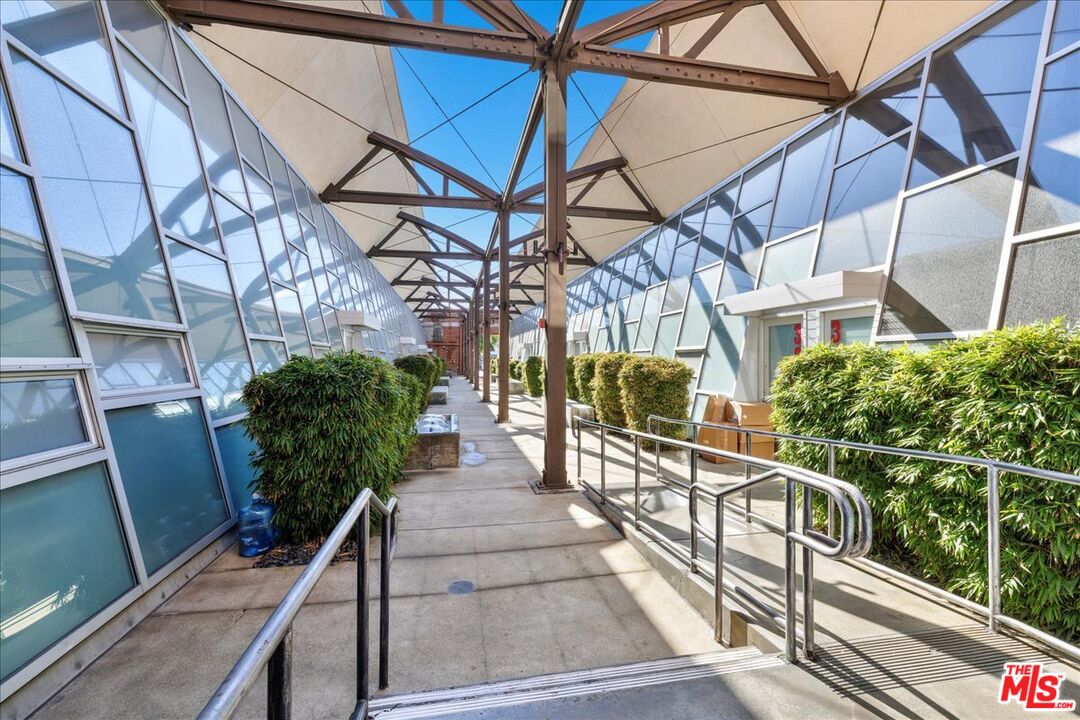 120 South Hewitt Street, Unit 6 Los Angeles, CA 90012 - Photo 44 of 48 a view of a balcony with chairs