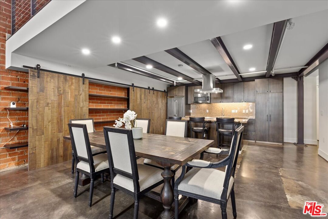 120 South Hewitt Street, Unit 6 Los Angeles, CA 90012 - Photo 10 of 48 a view of a dining room with furniture