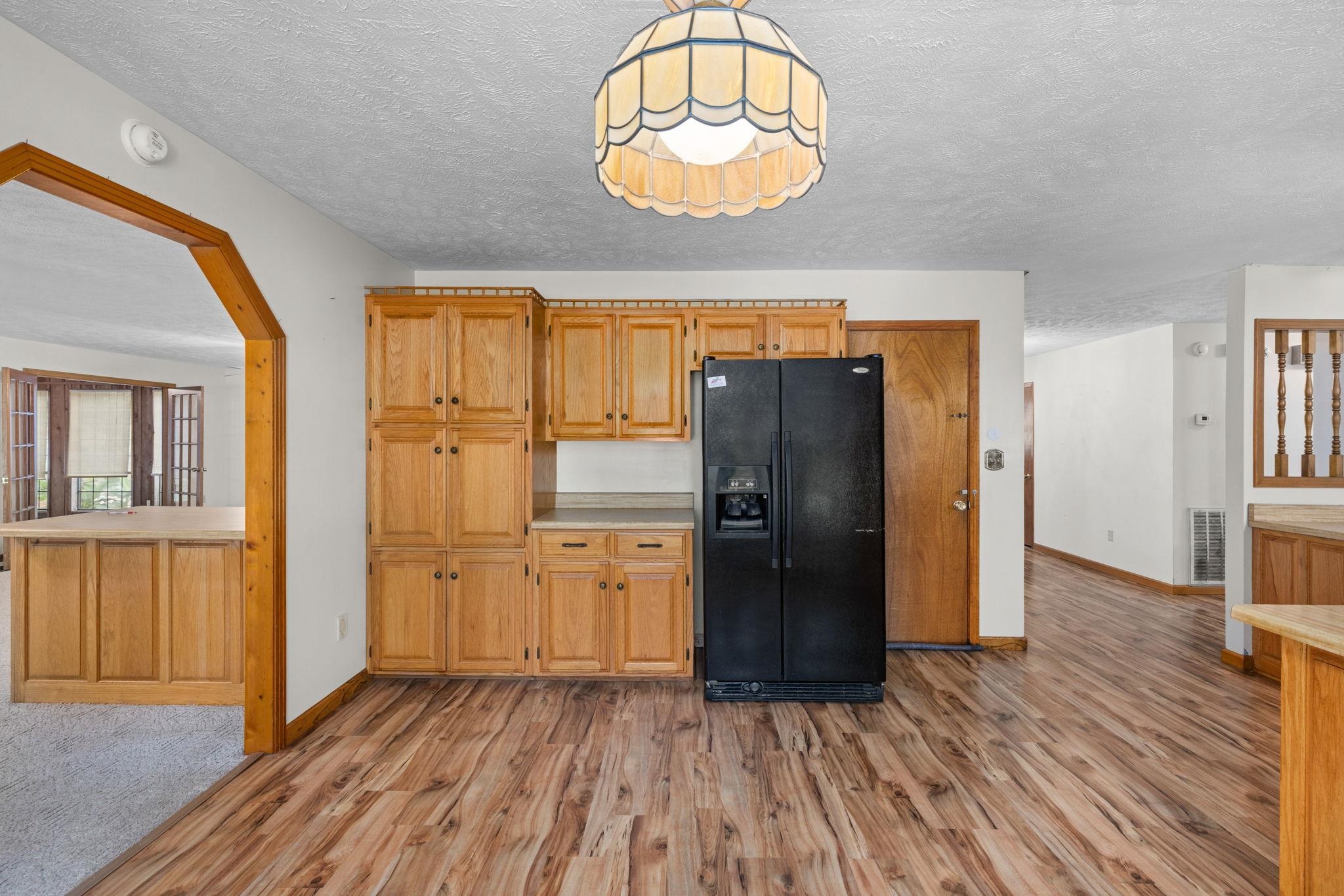 165 Highway 201 Reagan, TN 38368 - Photo 16 of 40 wooden floor in an empty room with a window