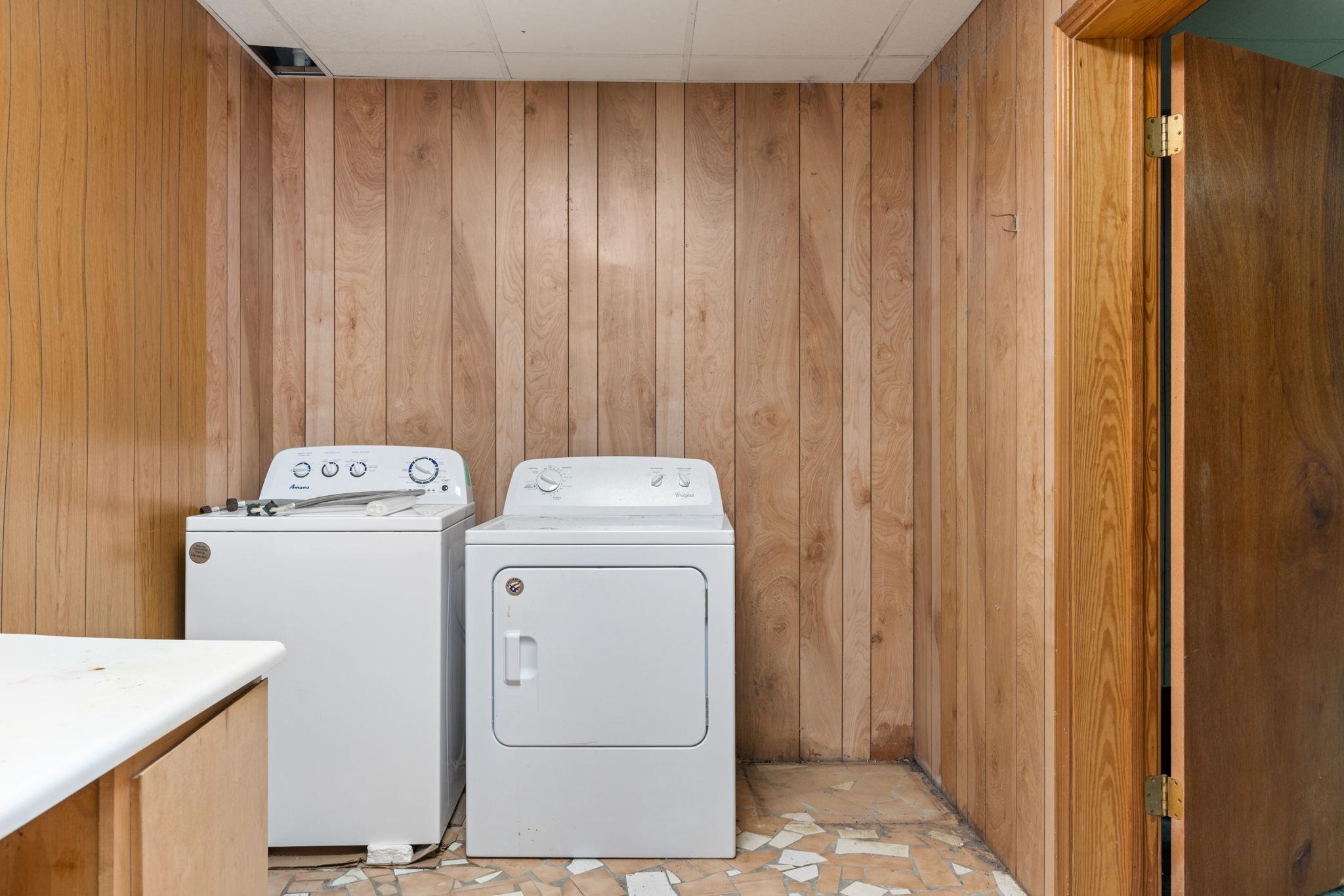 165 Highway 201 Reagan, TN 38368 - Photo 19 of 40 Washroom with wooden walls and washing machine and dryer
