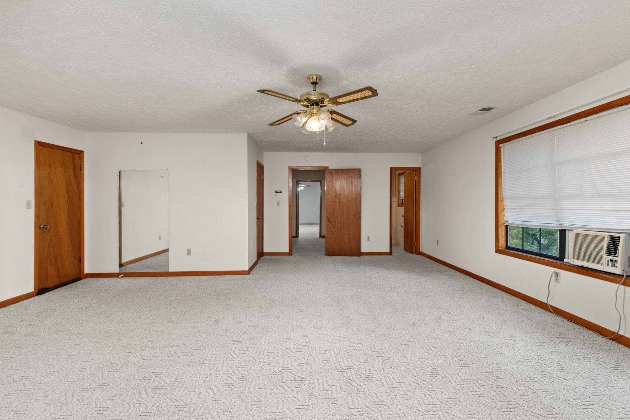 165 Highway 201 Reagan, TN 38368 - Photo 25 of 40 a view of a room with a ceiling fan and window