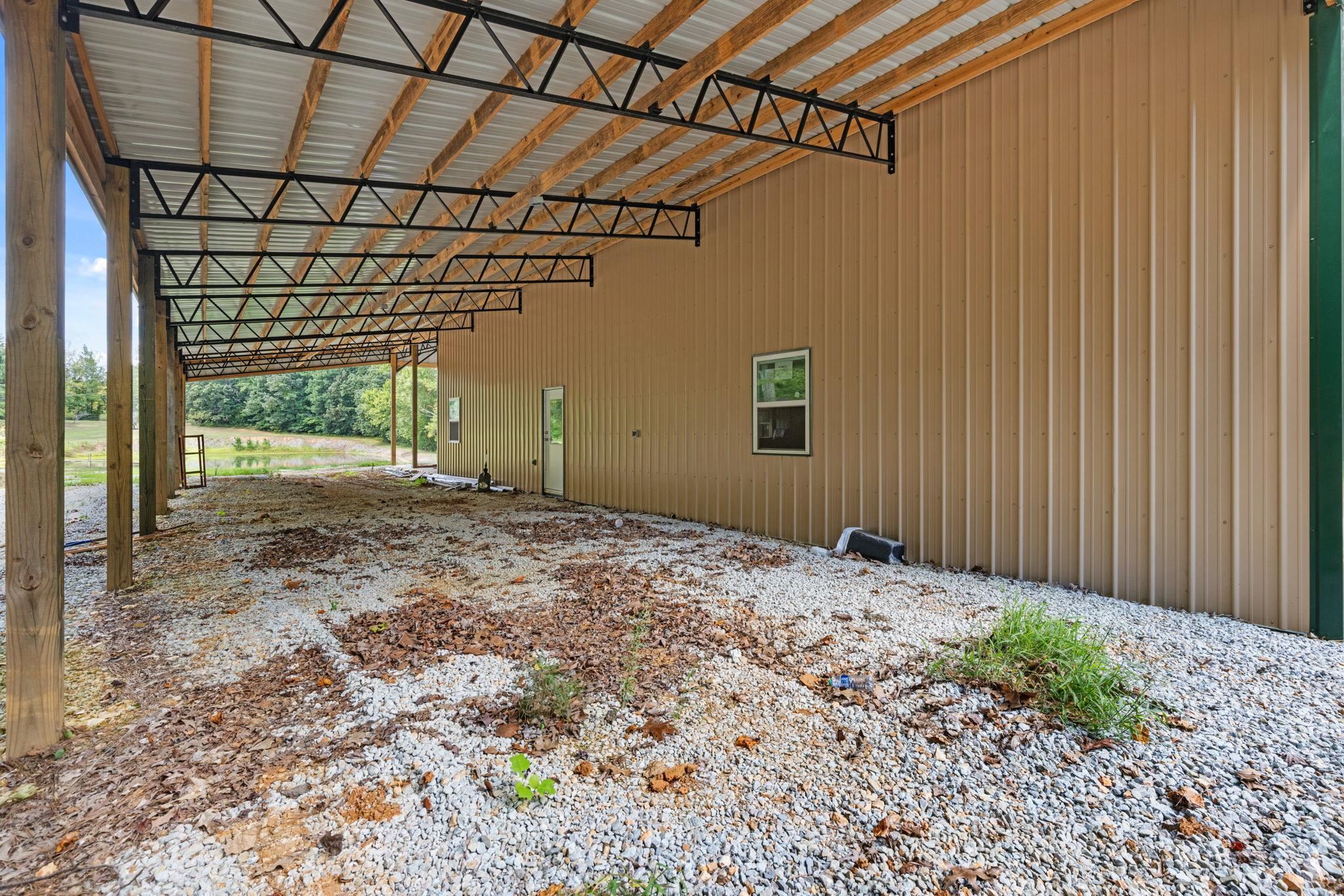 165 Highway 201 Reagan, TN 38368 - Photo 26 of 40 View of side of property with an attached carport