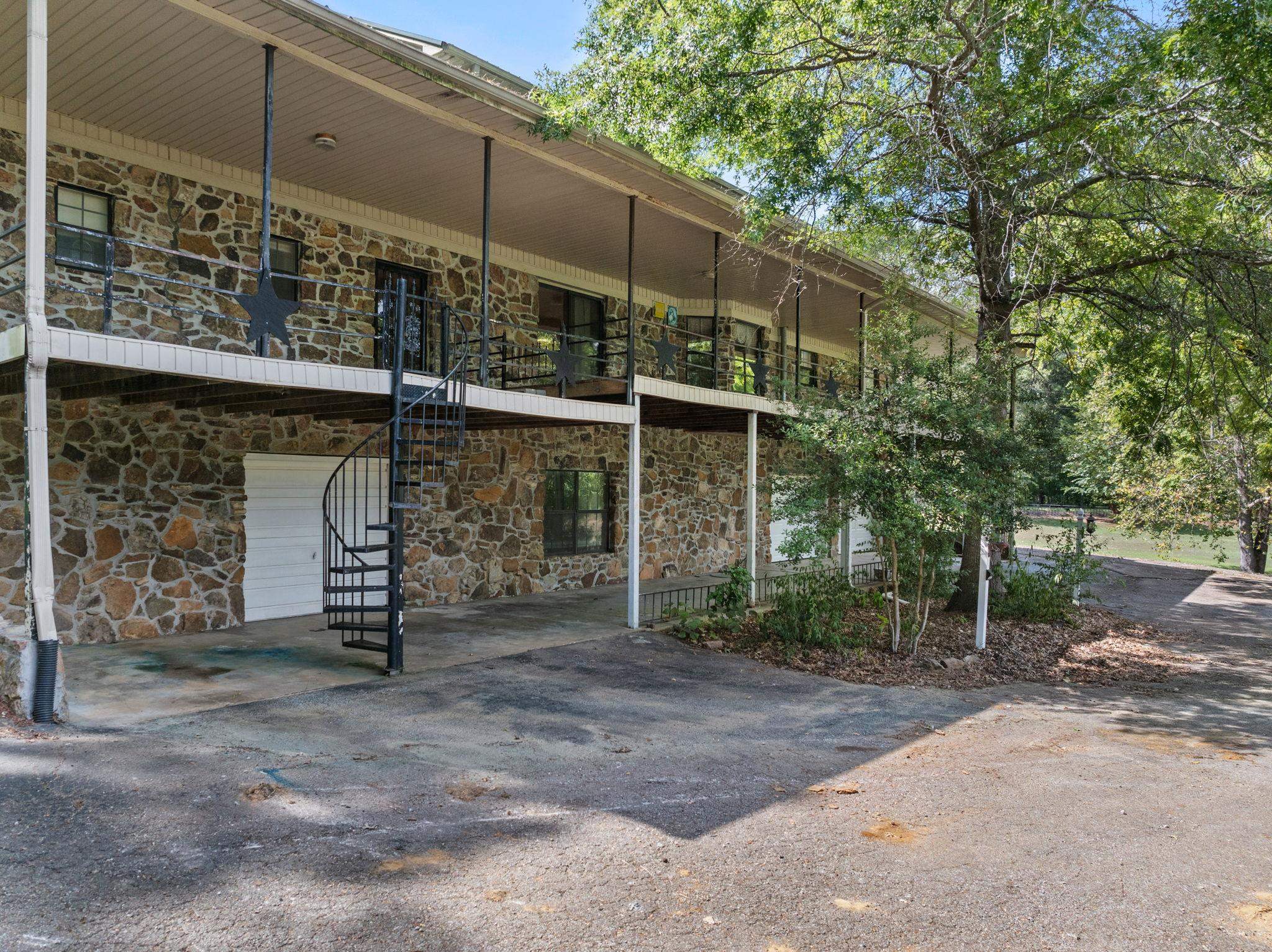 165 Highway 201 Reagan, TN 38368 - Photo 31 of 40 a front view of a house with a yard