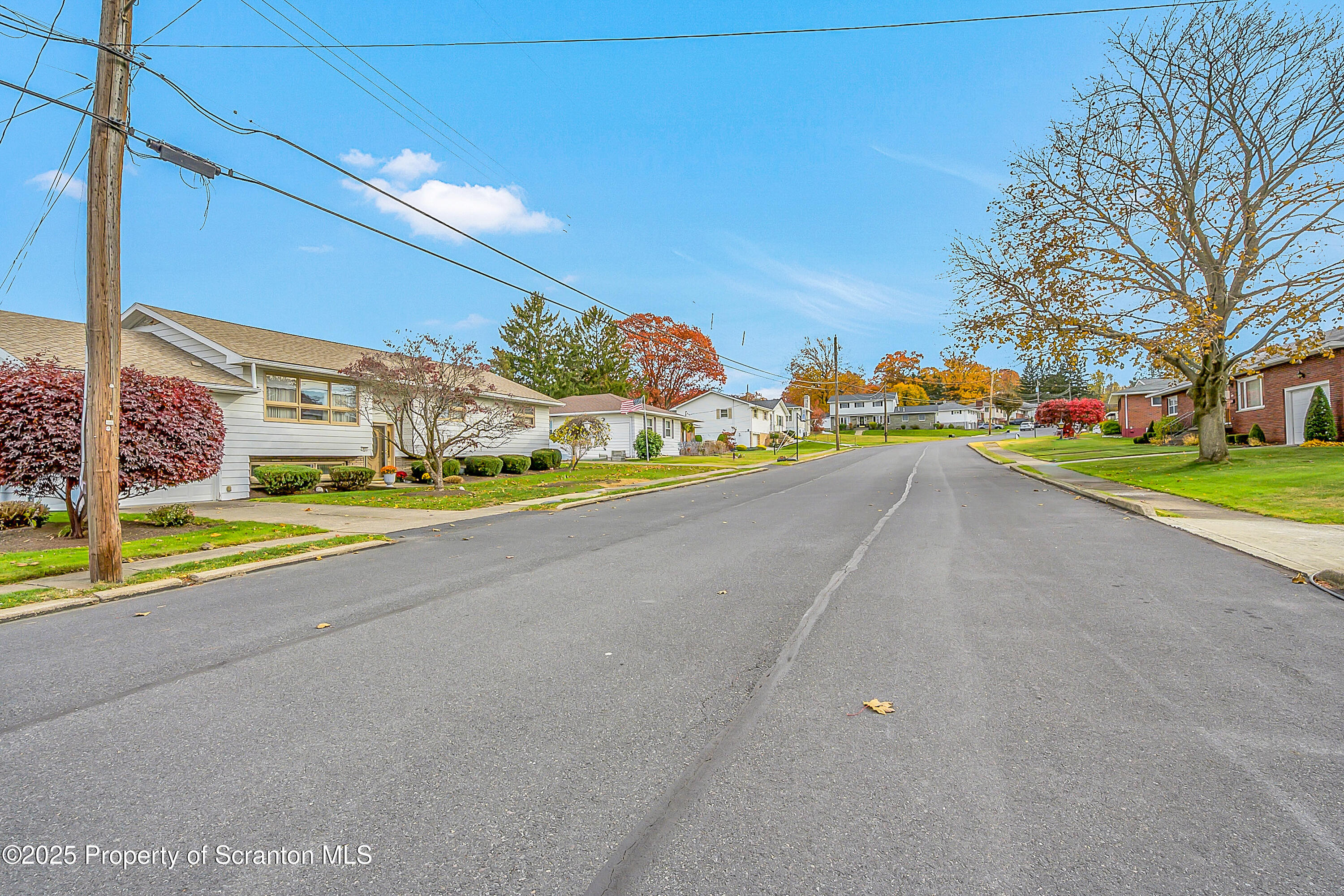 807 Marion Lane Moosic, PA 18507 - Photo 13 of 42 a view of a house with a yard and a street