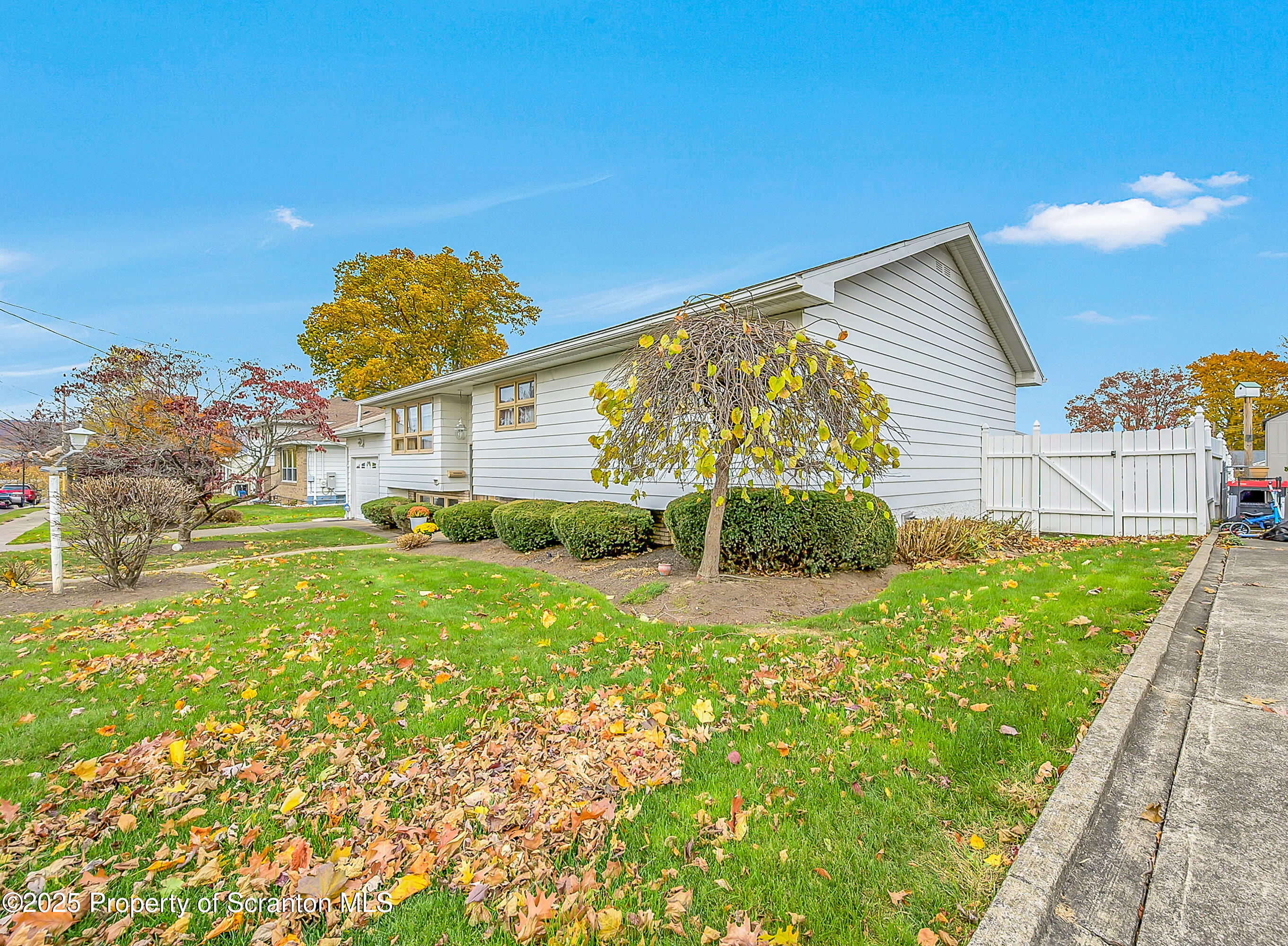 807 Marion Lane Moosic, PA 18507 - Photo 15 of 42 a view of a house with backyard and garden