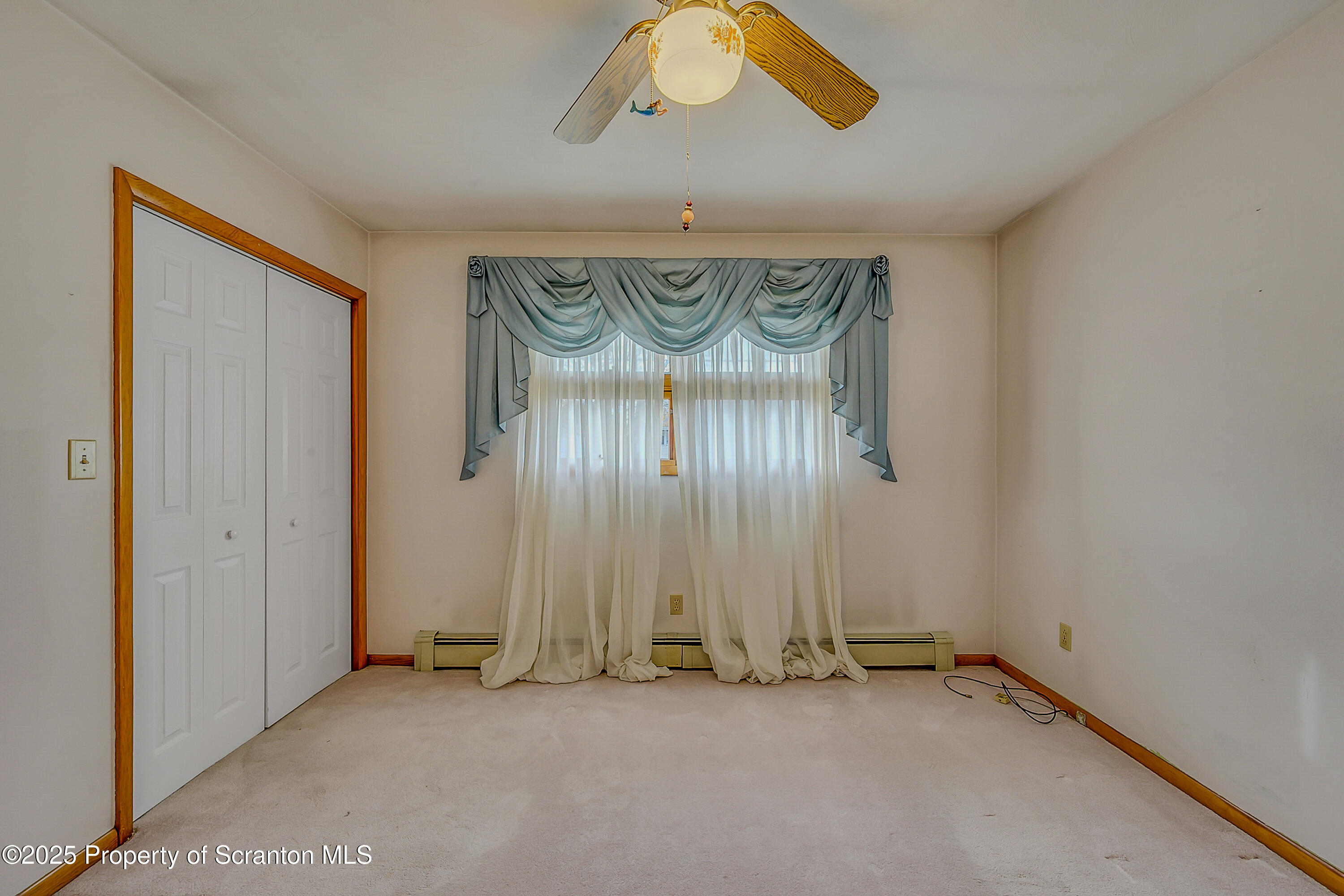 807 Marion Lane Moosic, PA 18507 - Photo 25 of 42 an empty room with windows and furniture