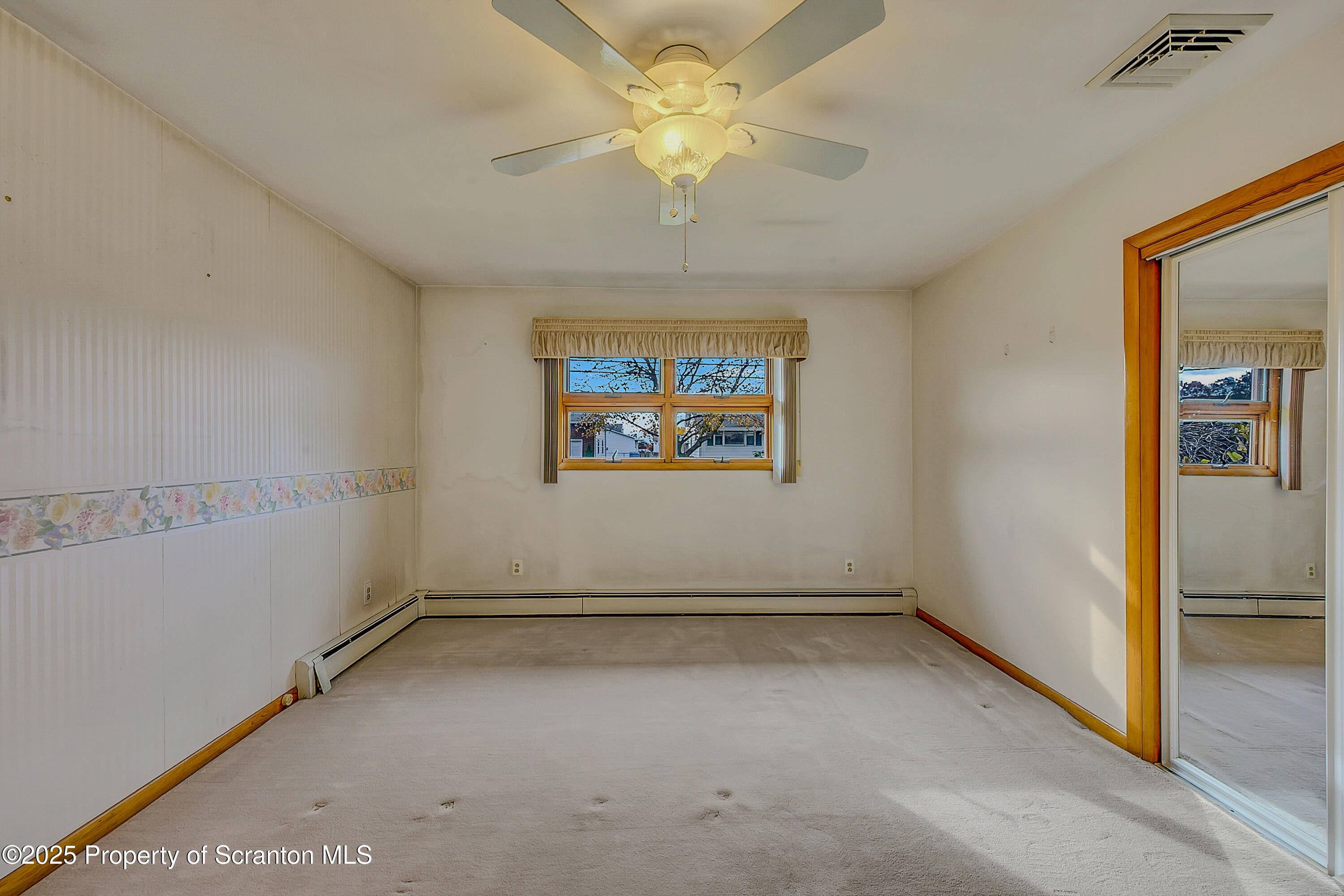 807 Marion Lane Moosic, PA 18507 - Photo 30 of 42 wooden floor in an empty room with a window