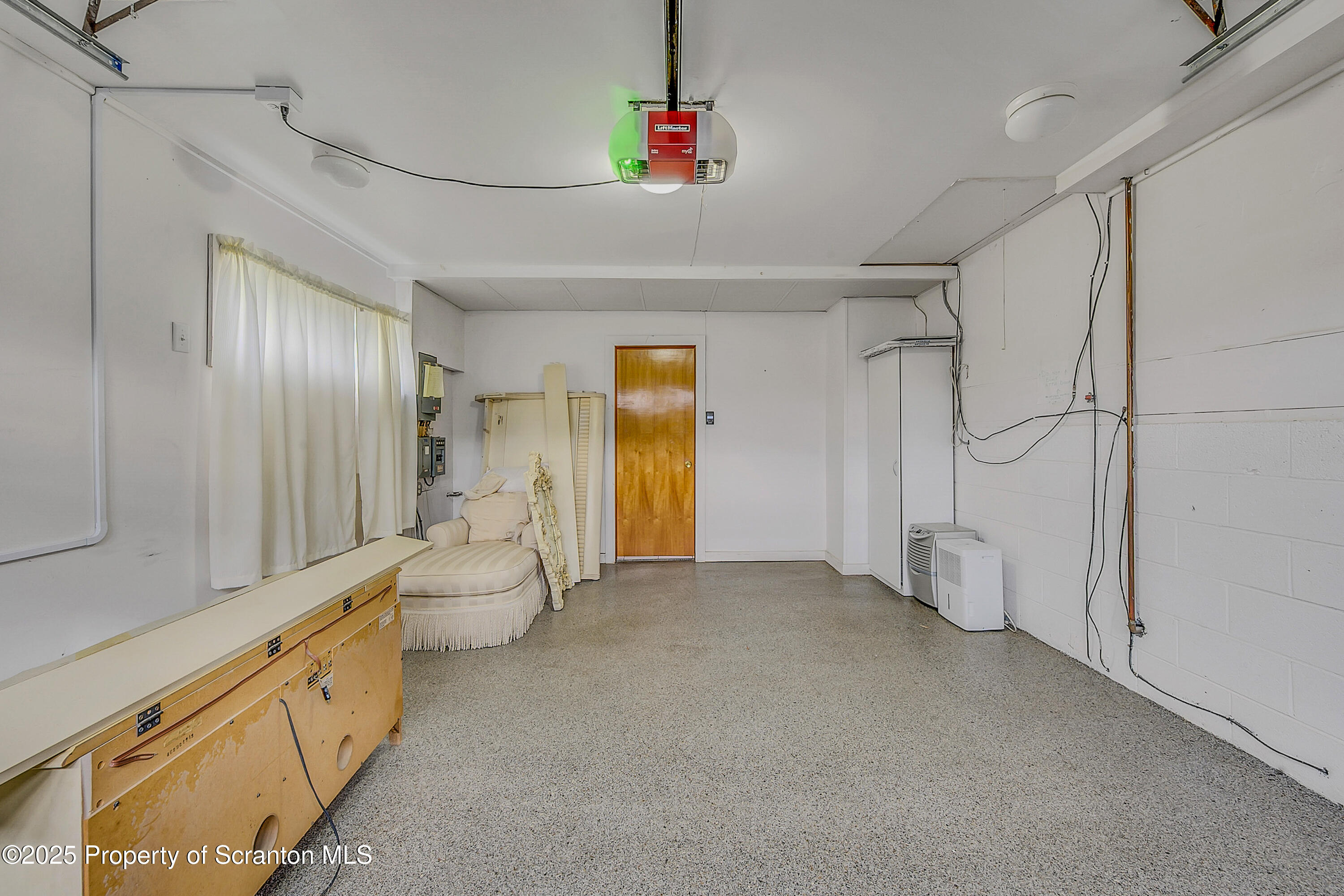 807 Marion Lane Moosic, PA 18507 - Photo 34 of 42 a bathroom with a double vanity sink and a mirror