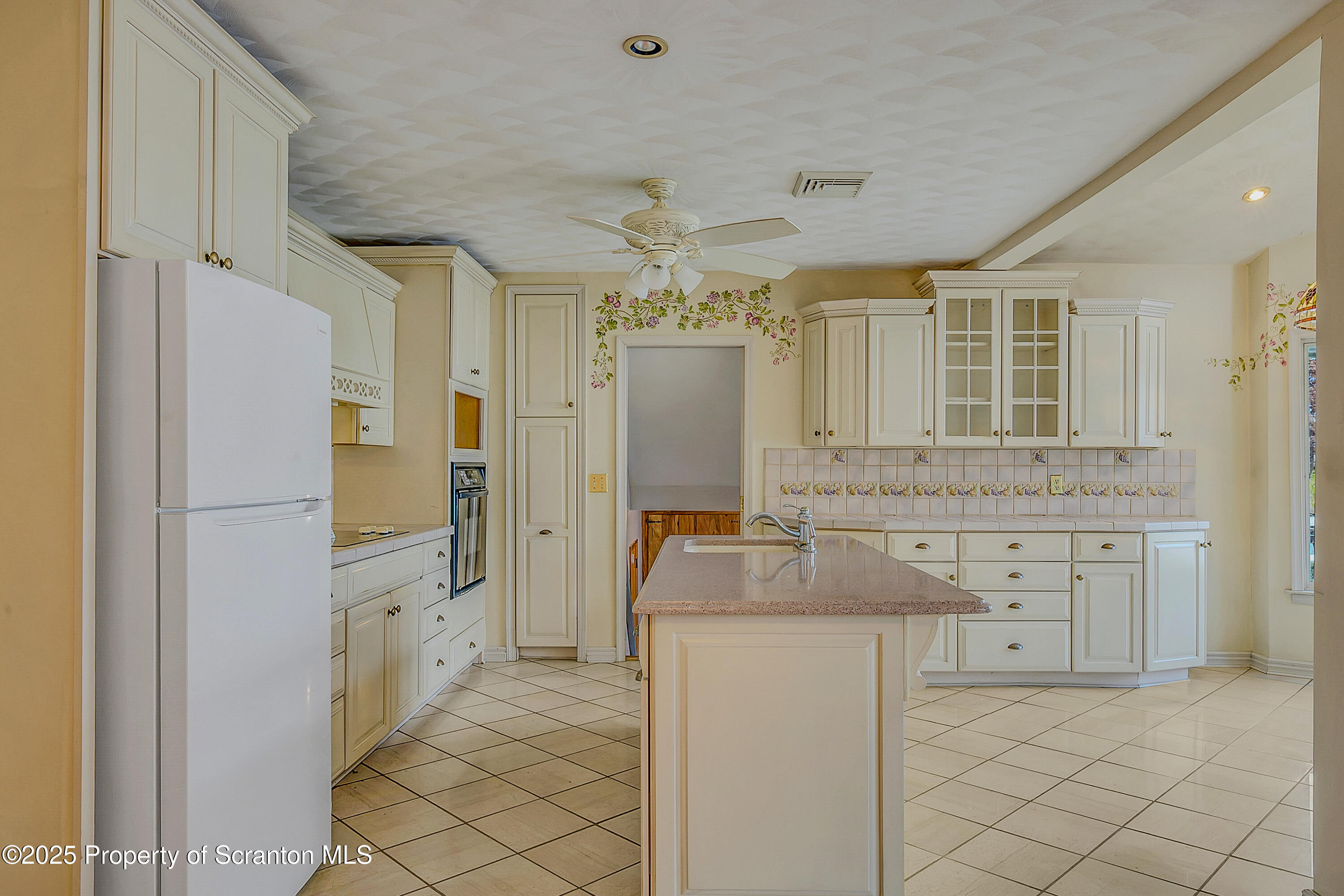 807 Marion Lane Moosic, PA 18507 - Photo 5 of 42 a bathroom with a granite countertop sink mirror and a shower
