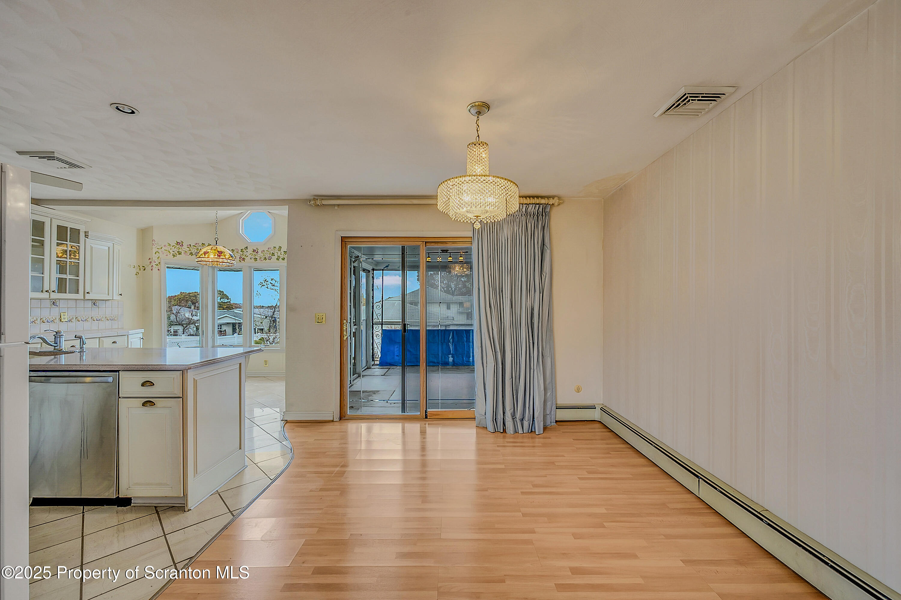 807 Marion Lane Moosic, PA 18507 - Photo 7 of 42 a view of a kitchen cabinets and wooden floor
