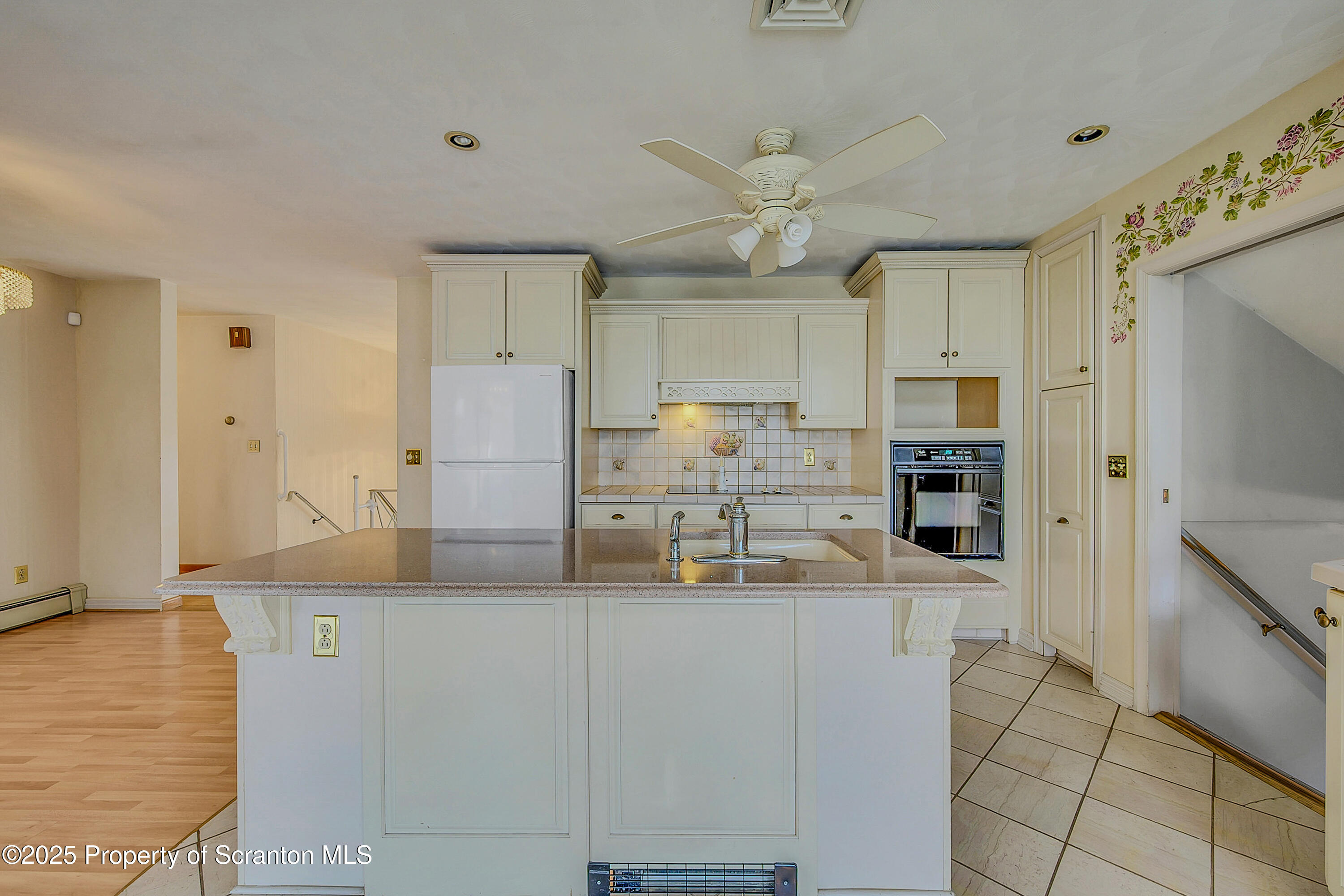807 Marion Lane Moosic, PA 18507 - Photo 10 of 42 a kitchen with stainless steel appliances granite countertop a refrigerator and a stove