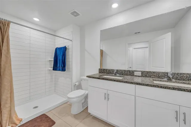 a picture of a building with a yard