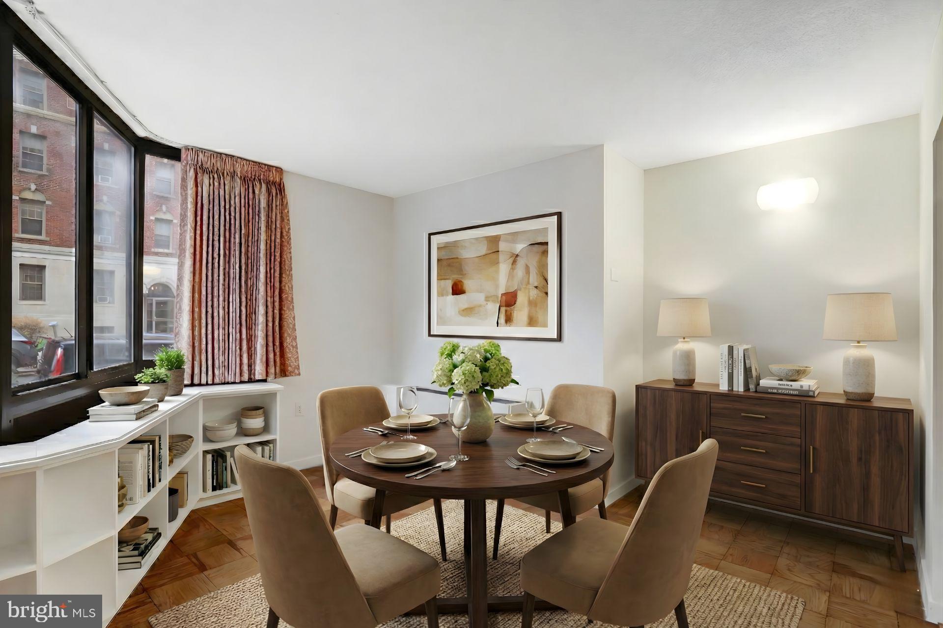 1718 P Street Northwest, Unit L8 Washington, DC 20036 - Photo 3 of 14 a view of a a dining room with furniture window and wooden floor