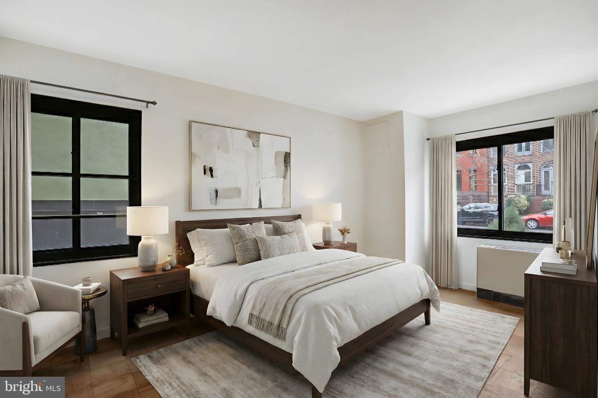 1718 P Street Northwest, Unit L8 Washington, DC 20036 - Photo 7 of 14 a bedroom with a bed and a couch