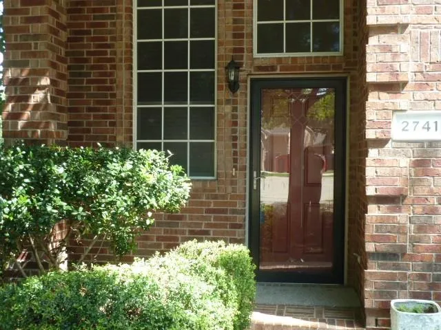 a view of a yard with patio