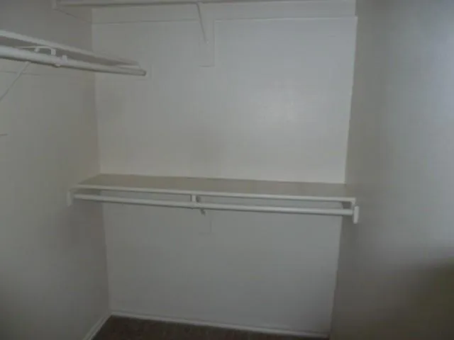 a view of a room that has a window in it