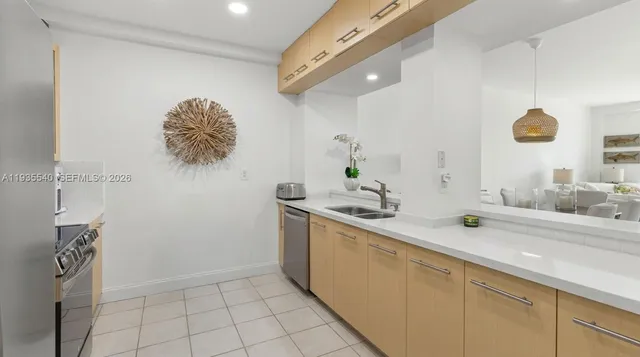 a spacious bathroom with a sink a mirror and vanity