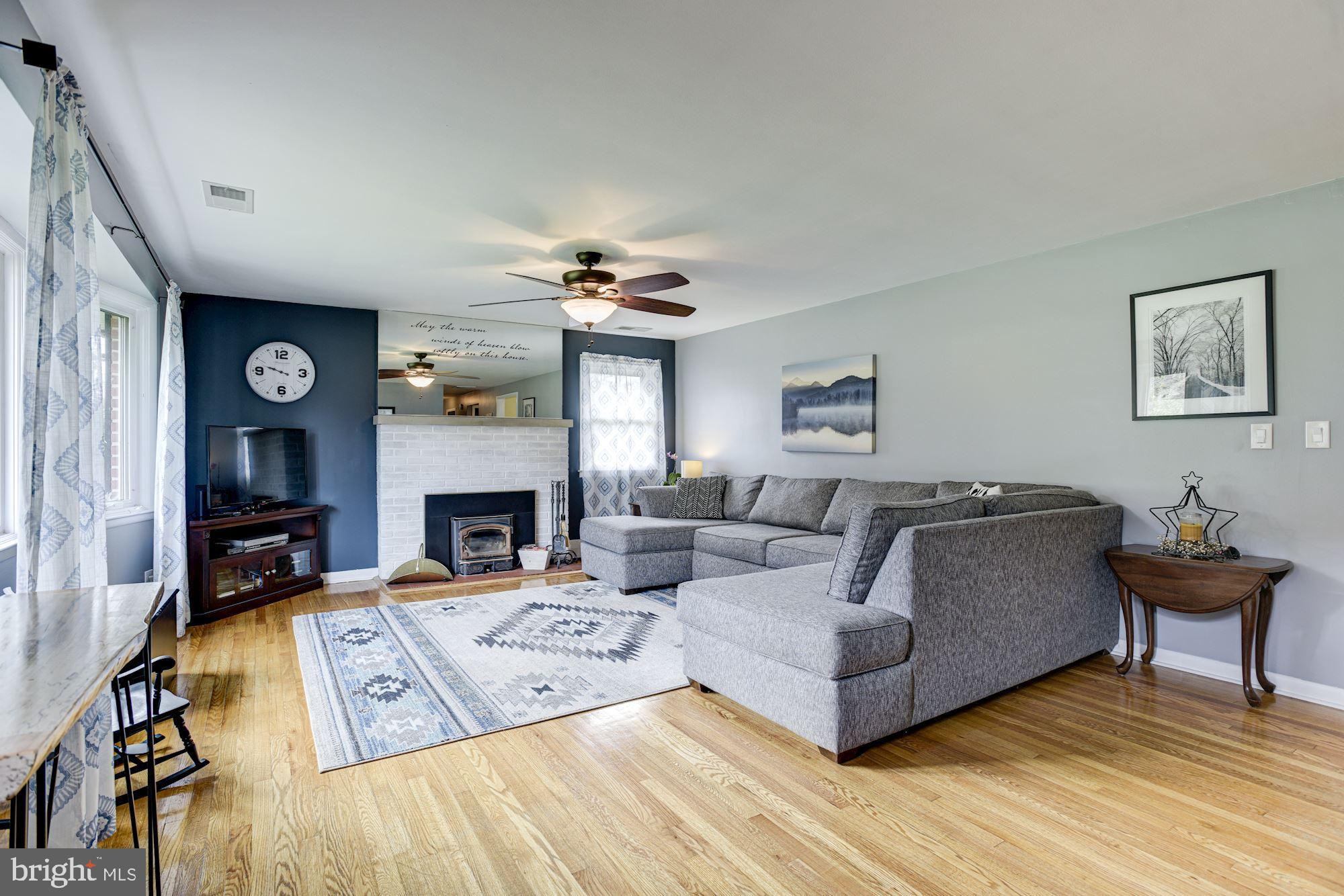 8615 Windsor Mill Road Baltimore, MD 21244 - Photo 2 of 31 Living Room | Hardwood Floors | Fireplace