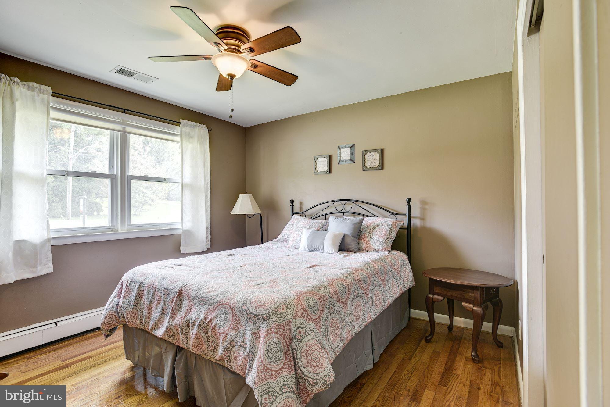8615 Windsor Mill Road Baltimore, MD 21244 - Photo 18 of 31 Bedroom | Hardwood Floors