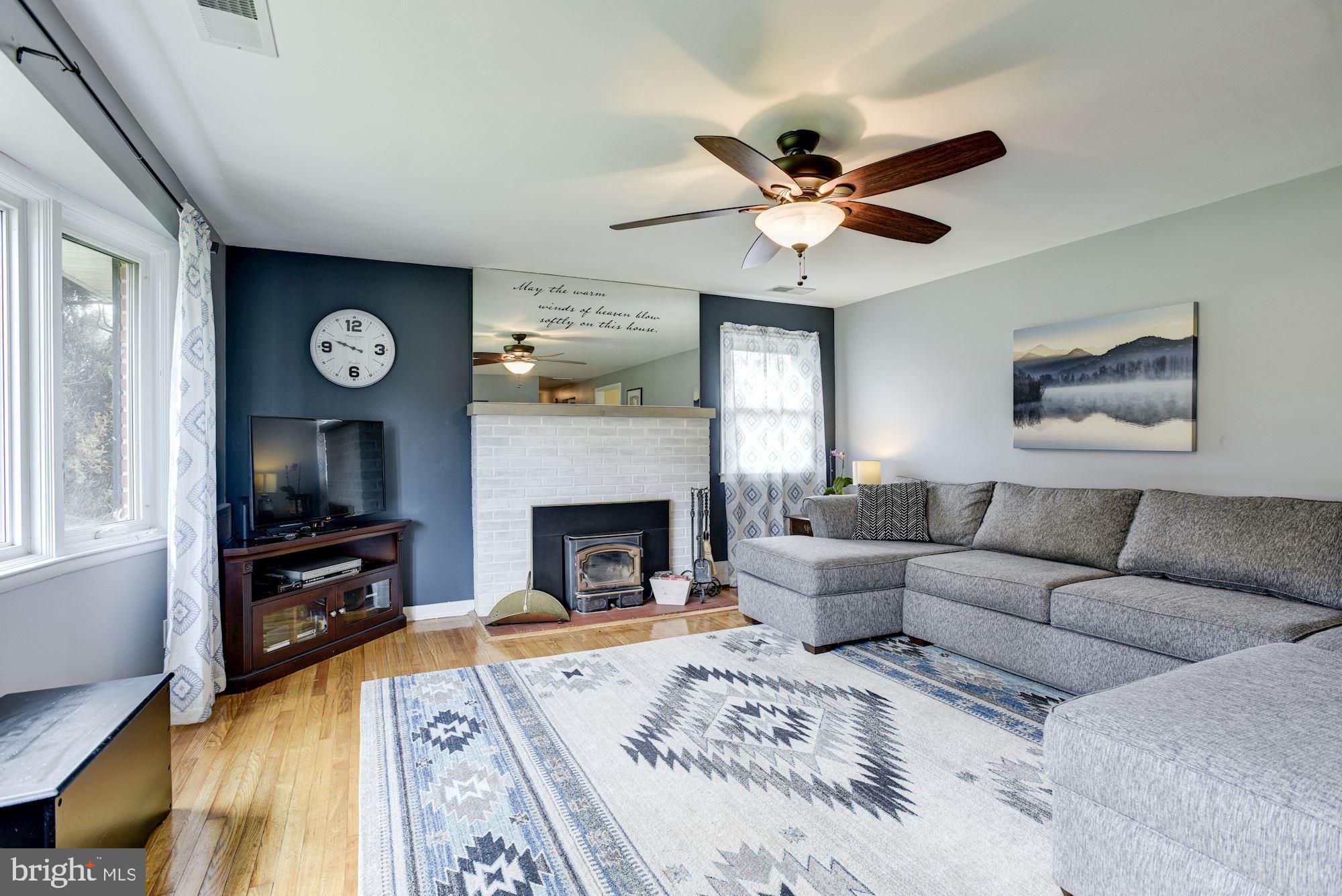 8615 Windsor Mill Road Baltimore, MD 21244 - Photo 3 of 31 Living Room | Hardwood Floors | Fireplace