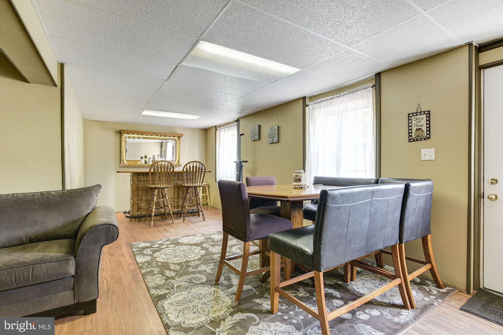 8615 Windsor Mill Road Baltimore, MD 21244 - Photo 22 of 31 Bonus Room | Access to Deck and Hot Tub