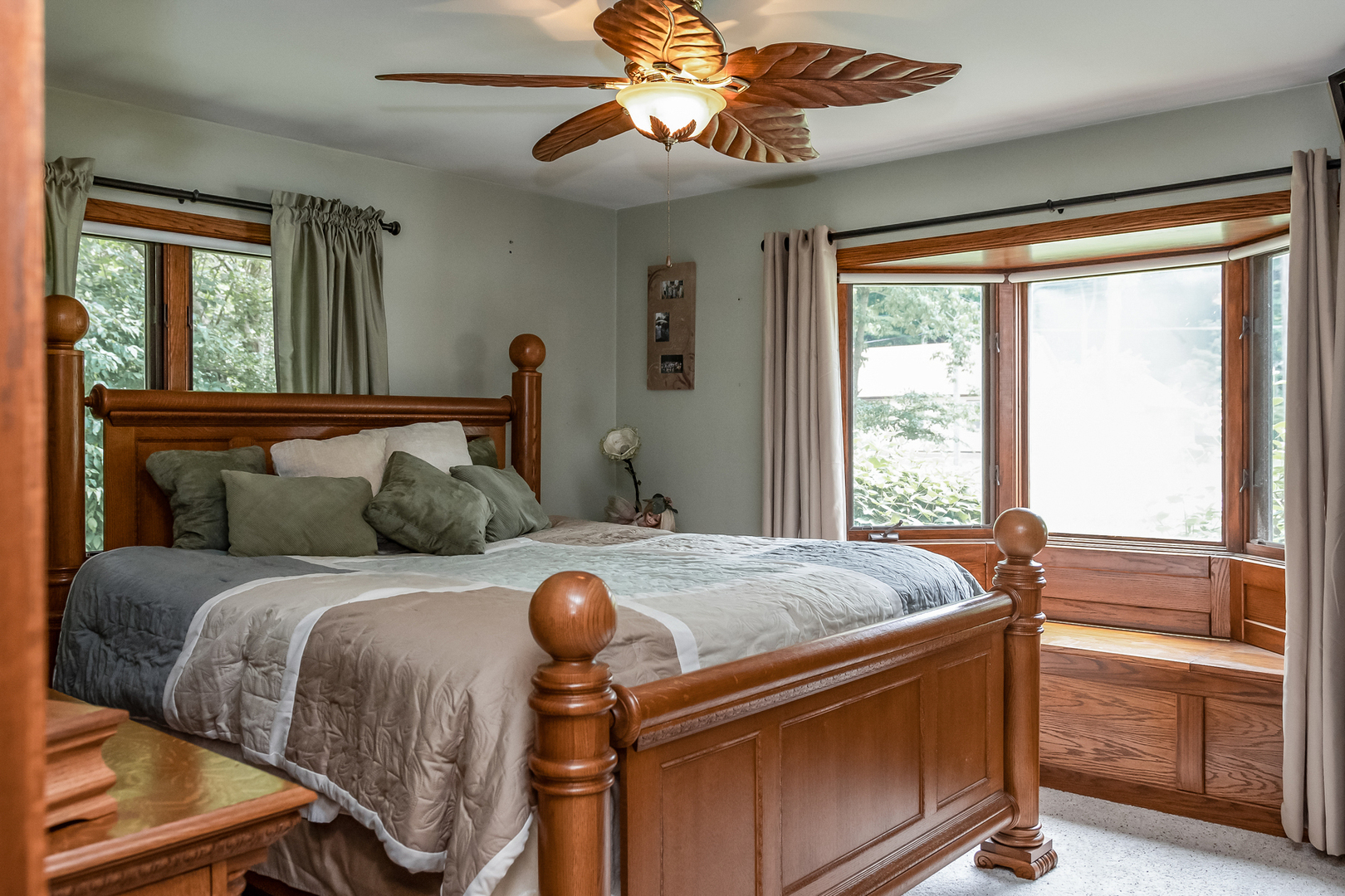 42W420 Kedeka Road Sugar Grove, IL 60554 - Photo 18 of 32 a bedroom with a bed and a chandelier