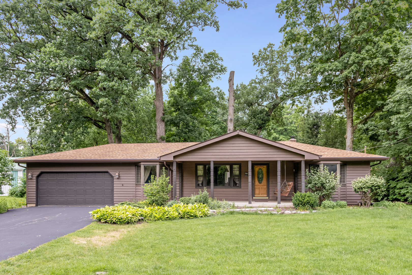42W420 Kedeka Road Sugar Grove, IL 60554 - Photo 32 of 32 a front view of a house with a yard