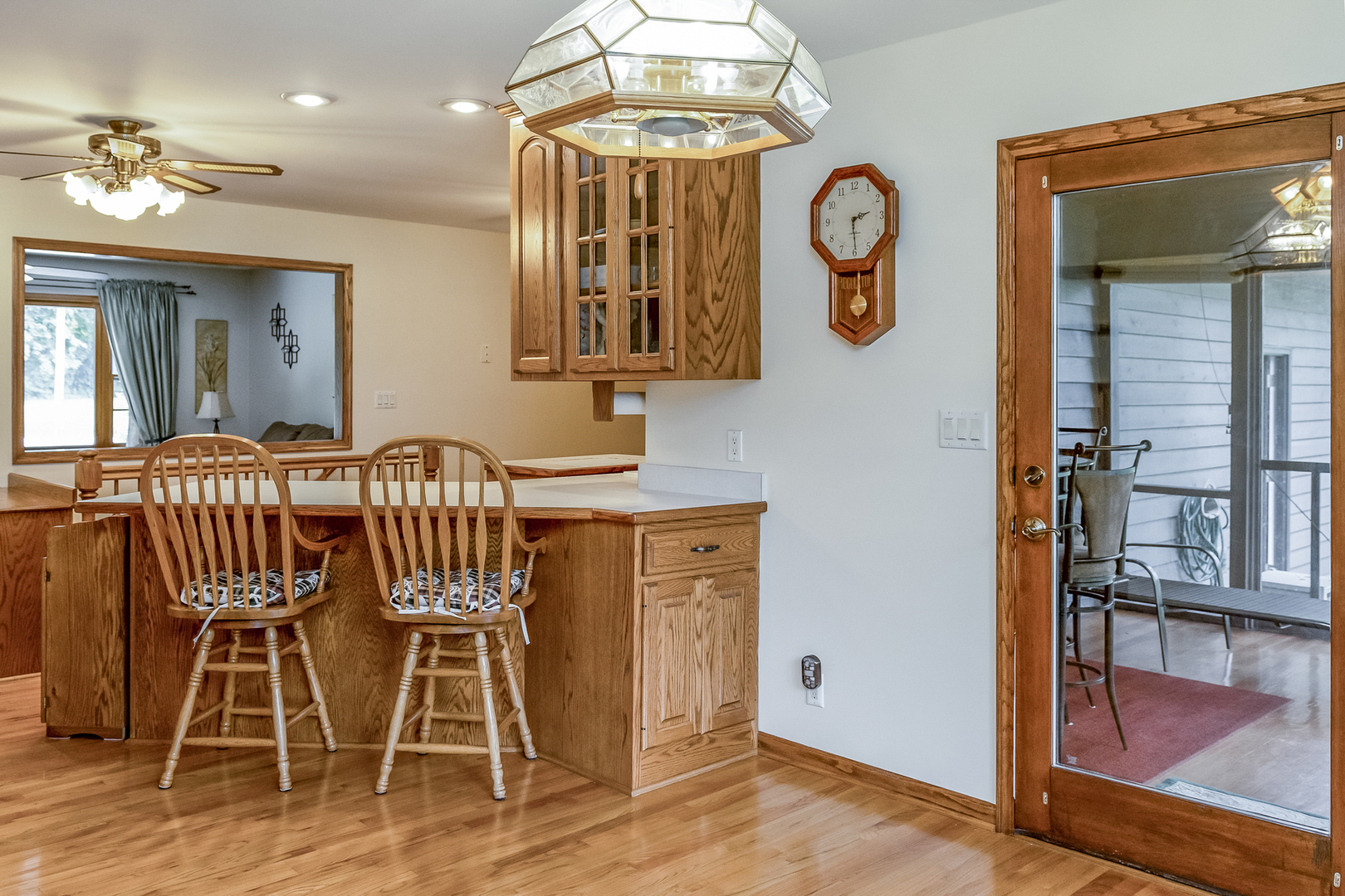 42W420 Kedeka Road Sugar Grove, IL 60554 - Photo 10 of 32 a view of a dining room with furniture window and wooden floor
