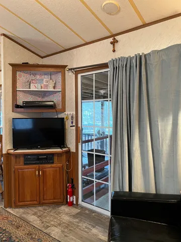 a room with furniture and window