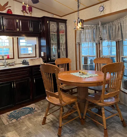 a view of a chairs and table in a room