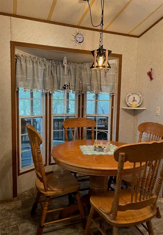 a kitchen with stainless steel appliances granite countertop a stove refrigerator a sink dishwasher and cabinets with wooden floor