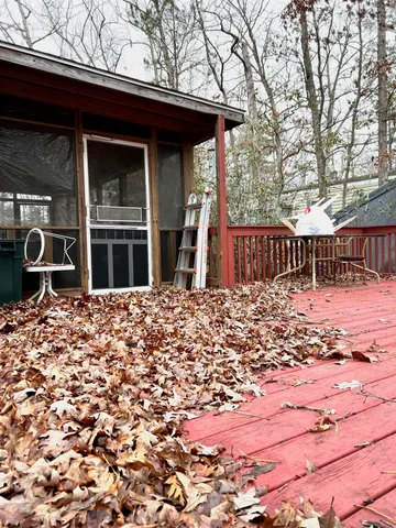 a view of a balcony with chairs