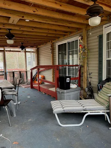 a view of a lake with houses in the background
