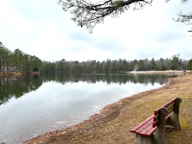 a view of a house with snow on the background