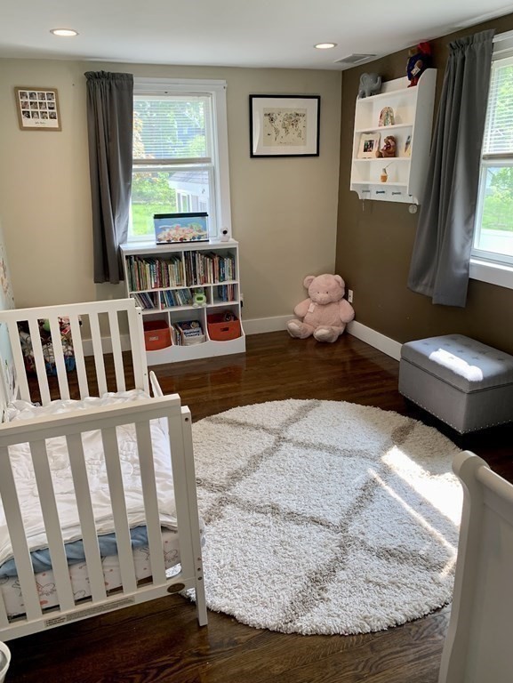 26 Chamberlain Road Chelmsford, MA 01824 - Photo 17 of 35 a living room with furniture and a large window