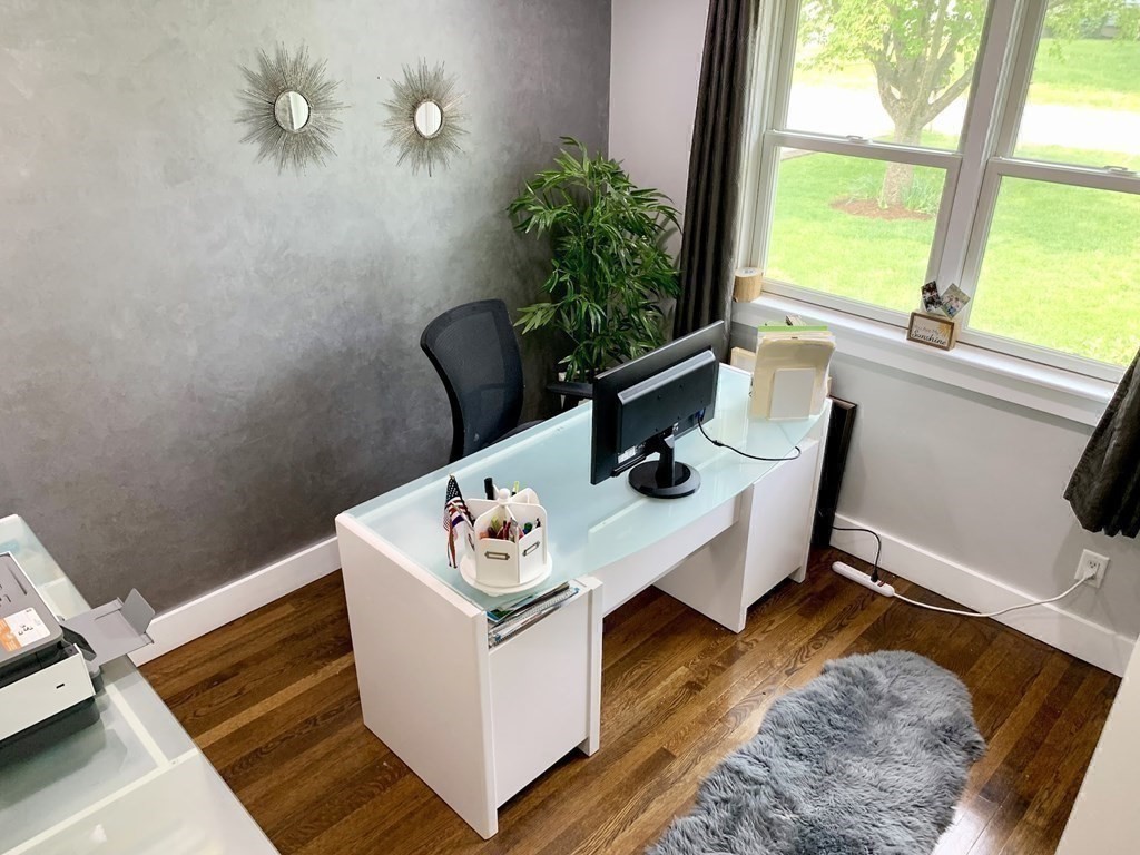 26 Chamberlain Road Chelmsford, MA 01824 - Photo 18 of 35 a living room with furniture and window