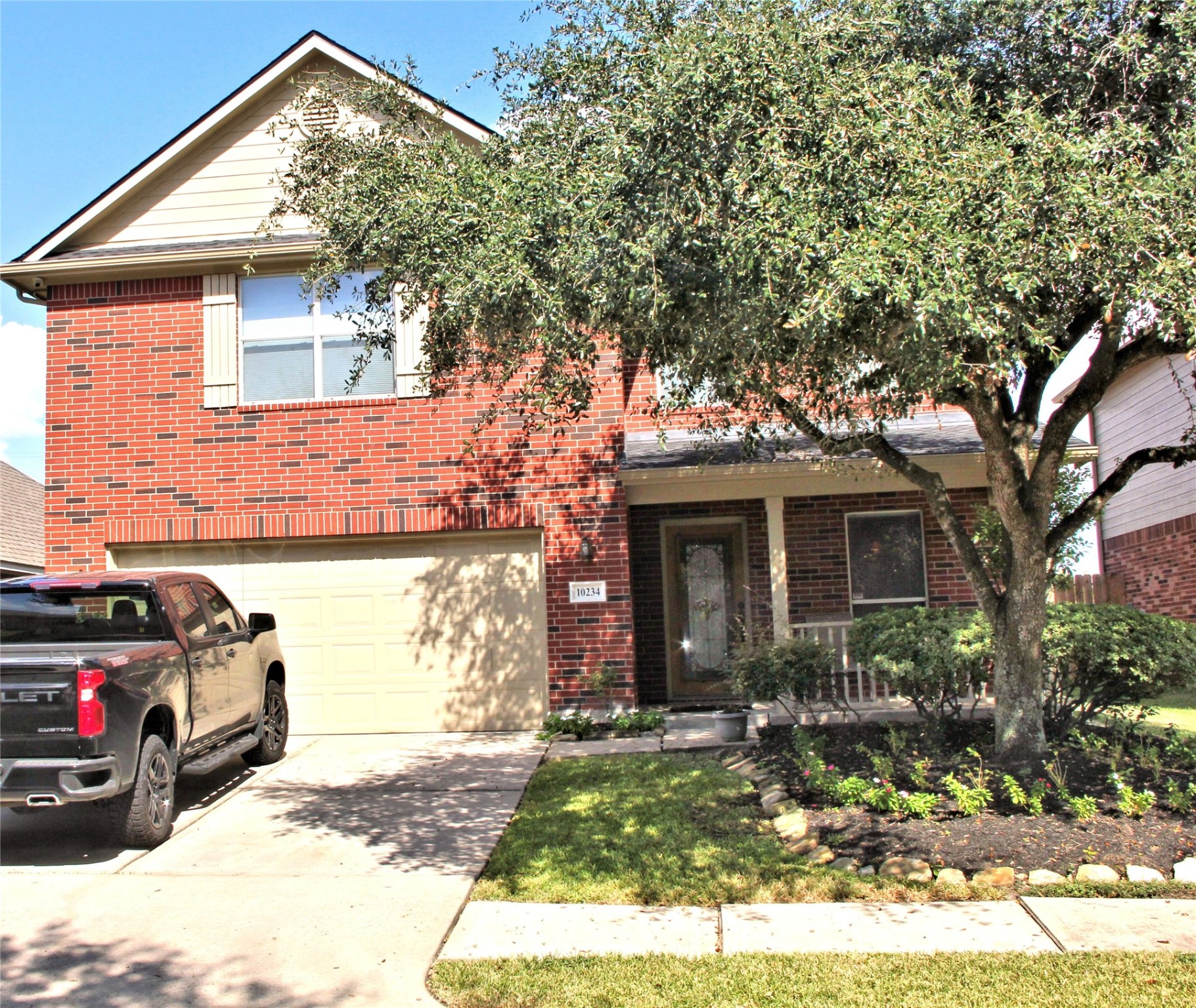 10234 Turrett Point Lane Houston, TX 77064 - Photo 15 of 17 a view of a house with a yard
