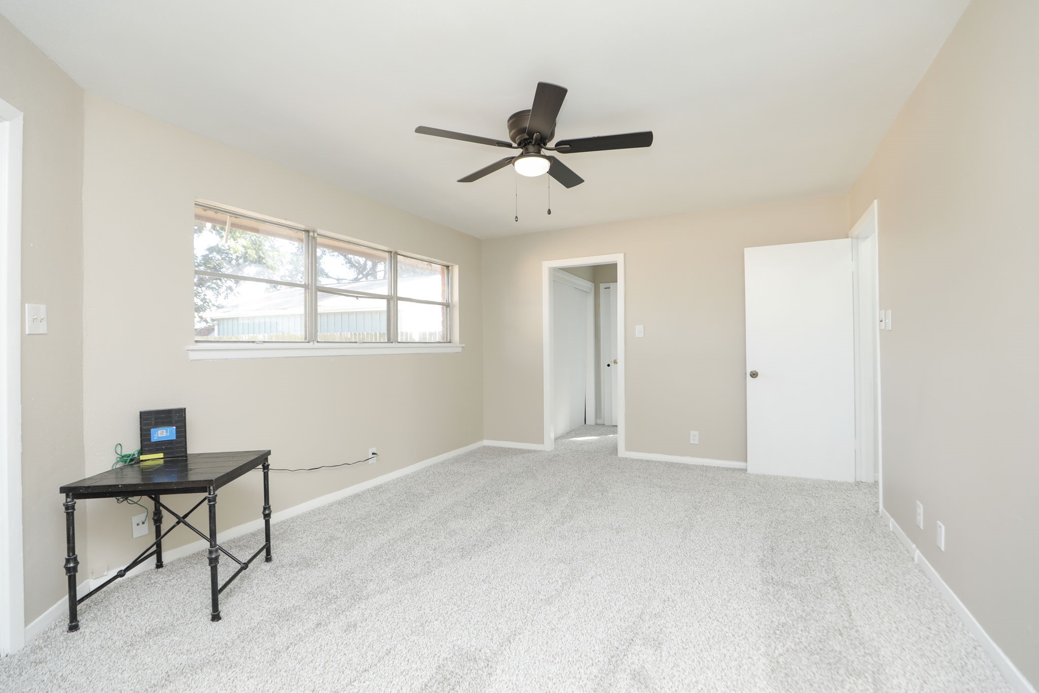 8235 Dover Street Houston, TX 77061 - Photo 25 of 36 a view of an empty room with a window
