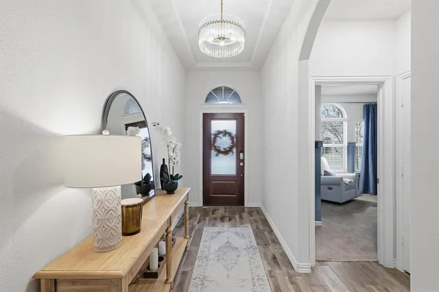 a view of entryway with wooden floor