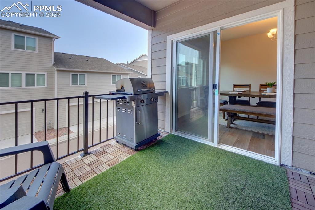 6069 Inman View Colorado Springs, CO 80924 - Photo 11 of 38 a view of backyard with a tub and a view of a house